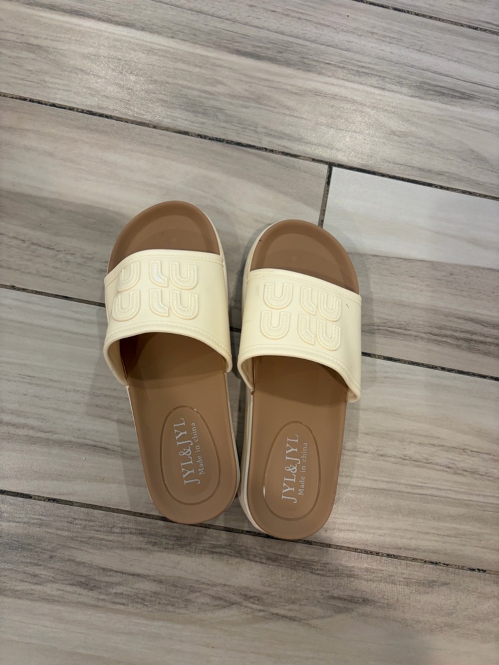 Miu Miu Cream Slide Sandals with Tan Footbed